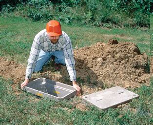 gravel bed for exterior electrical box|adding gravel after handhole is installed .